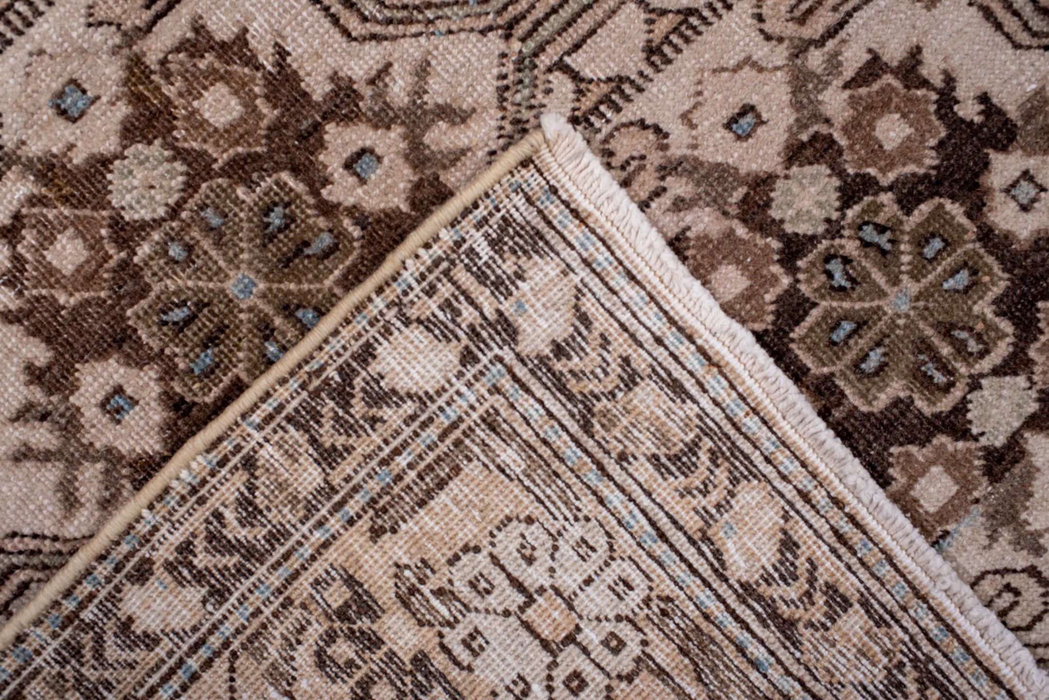 5' x 9' one-of-a-kind handmade antique Tabriz medium size rug. Color palette: ivory, brown, taupe, camel, charcoal, beige