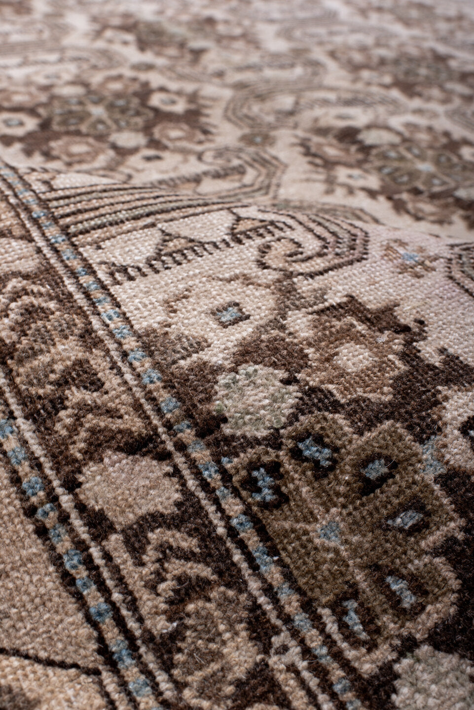 5' x 9' one-of-a-kind handmade antique Tabriz medium size rug. Color palette: ivory, brown, taupe, camel, charcoal, beige