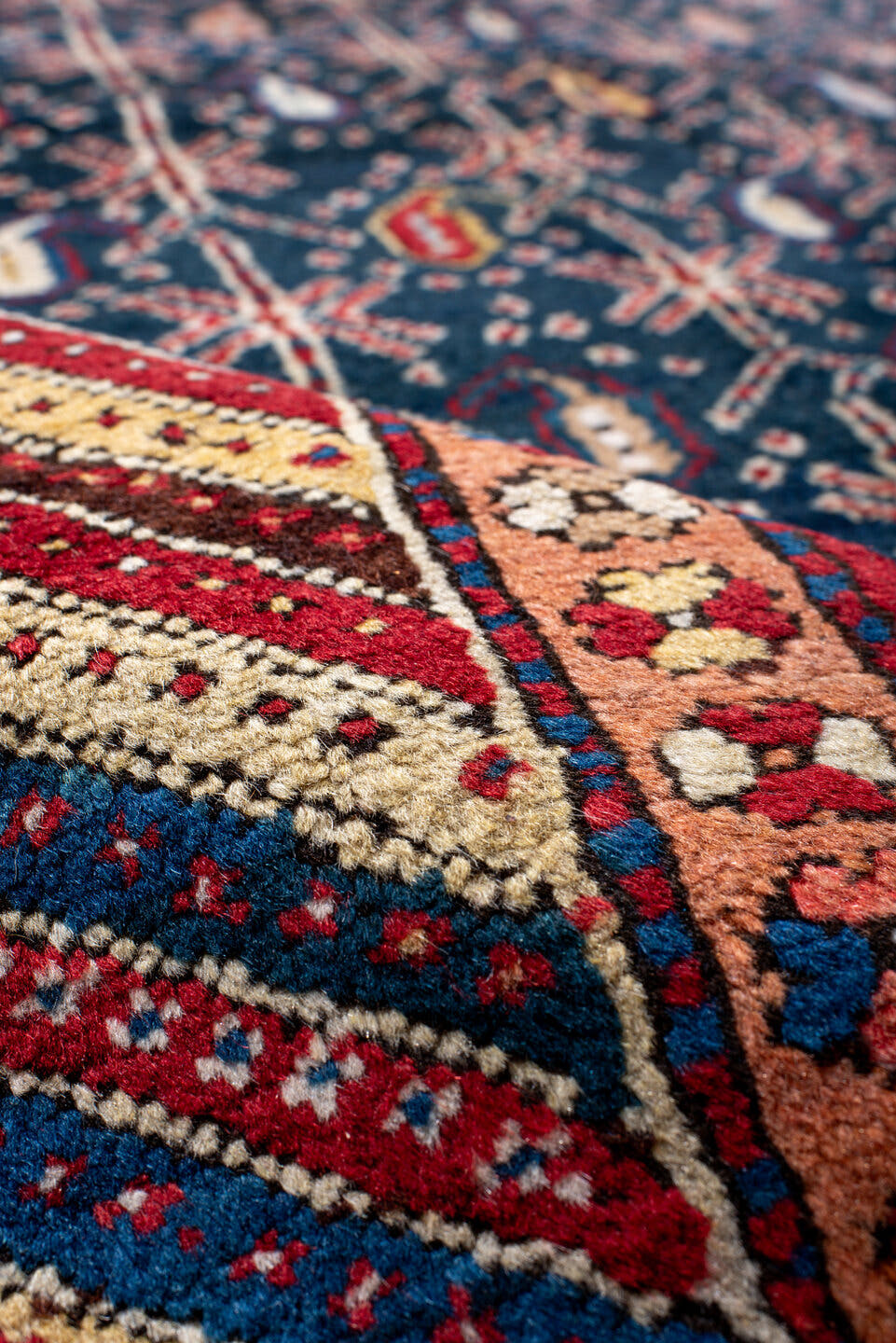 4' x 10' one-of-a-kind handmade antique NW Persian runner rug. Color palette: navy, ivory, red, cobalt, rust, camel, crimson