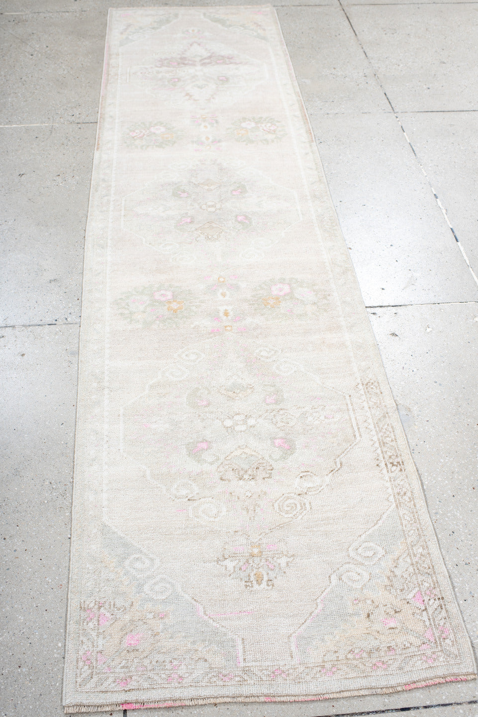 2' x 9' one-of-a-kind handmade antique Anatolian runner rug. Color palette: ivory, cream, blush, pale pink, taupe, sage