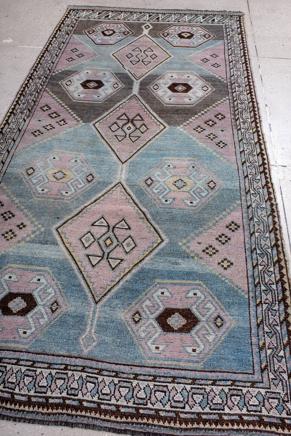 4' x 8' one-of-a-kind handmade antique Gabbe rug. Color palette: sky blue, lavender, charcoal, ivory, brown, blush, taupe