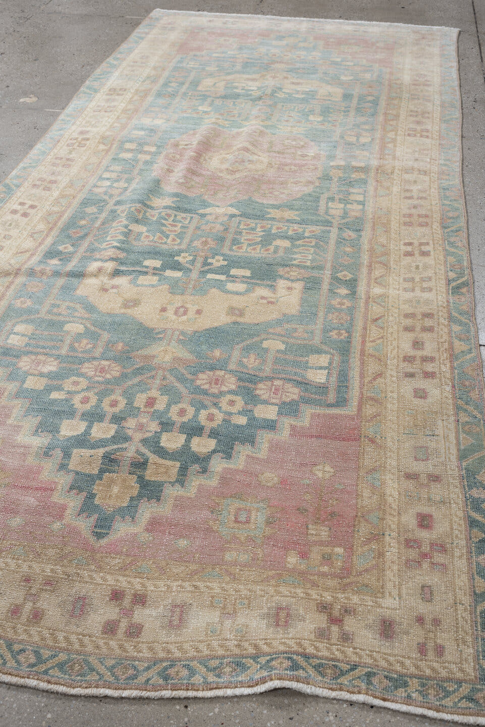 4' x 9' one-of-a-kind handmade vintage Saraband runner rug. Color palette: sky blue, ivory, blush, cream, taupe, sage, rose