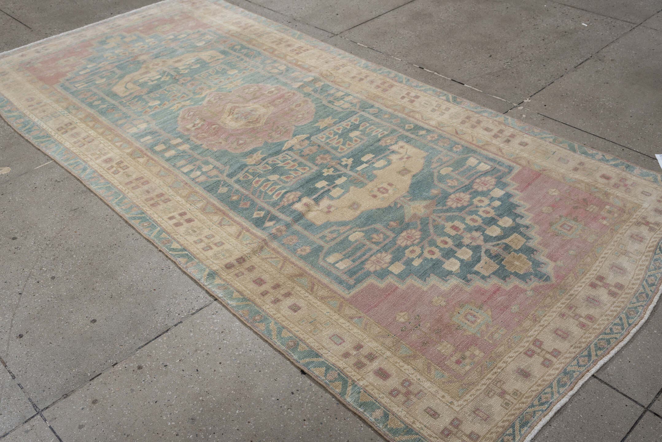 4' x 9' one-of-a-kind handmade vintage Saraband runner rug. Color palette: sky blue, ivory, blush, cream, taupe, sage, rose