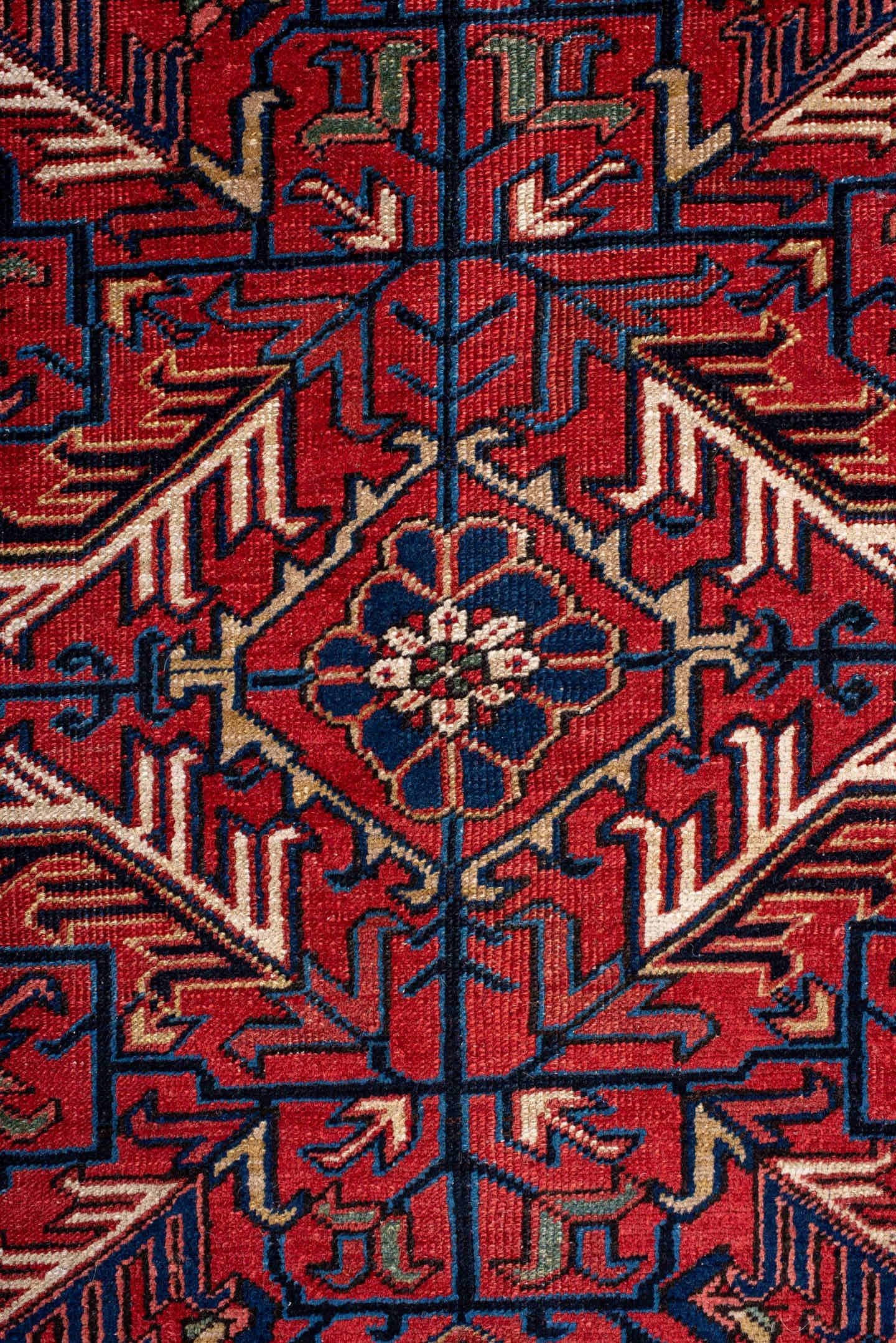 7' x 10' one-of-a-kind handmade antique Heriz large size rug. Color palette: red, navy, ivory, sky blue, camel, rust, brown