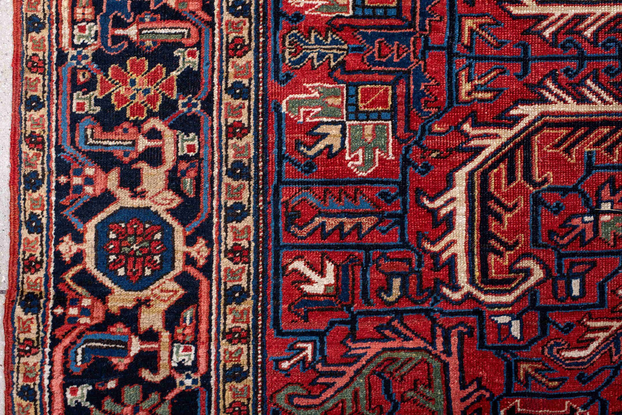 7' x 10' one-of-a-kind handmade antique Heriz large size rug. Color palette: red, navy, ivory, sky blue, camel, rust, brown