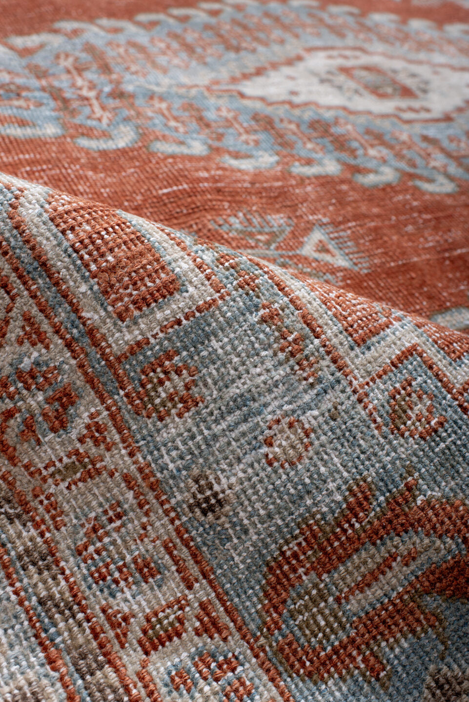 7' x 8' one-of-a-kind handmade antique Veece rug. Color palette: rust, pale blue, ivory, taupe, camel, terracotta, brown