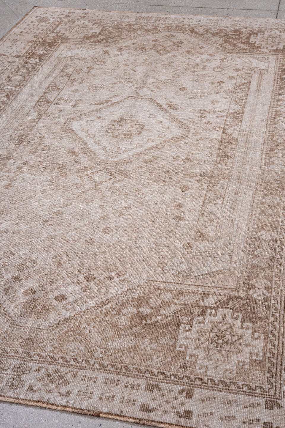 5' x 8' one-of-a-kind handmade vintage Shiraz medium size rug. Color palette: ivory, taupe, beige, camel, sand, gray