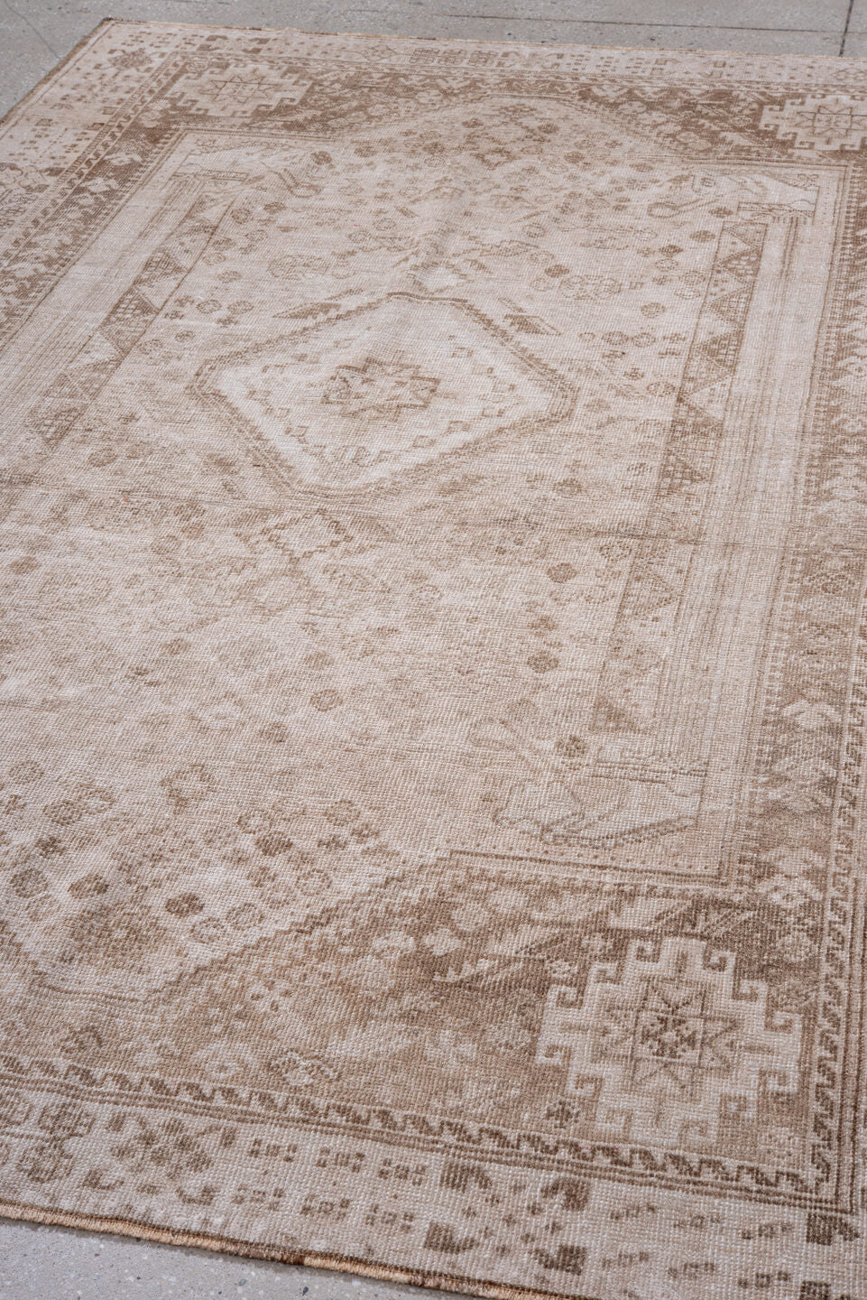 5' x 8' one-of-a-kind handmade vintage Shiraz medium size rug. Color palette: ivory, taupe, beige, camel, sand, gray
