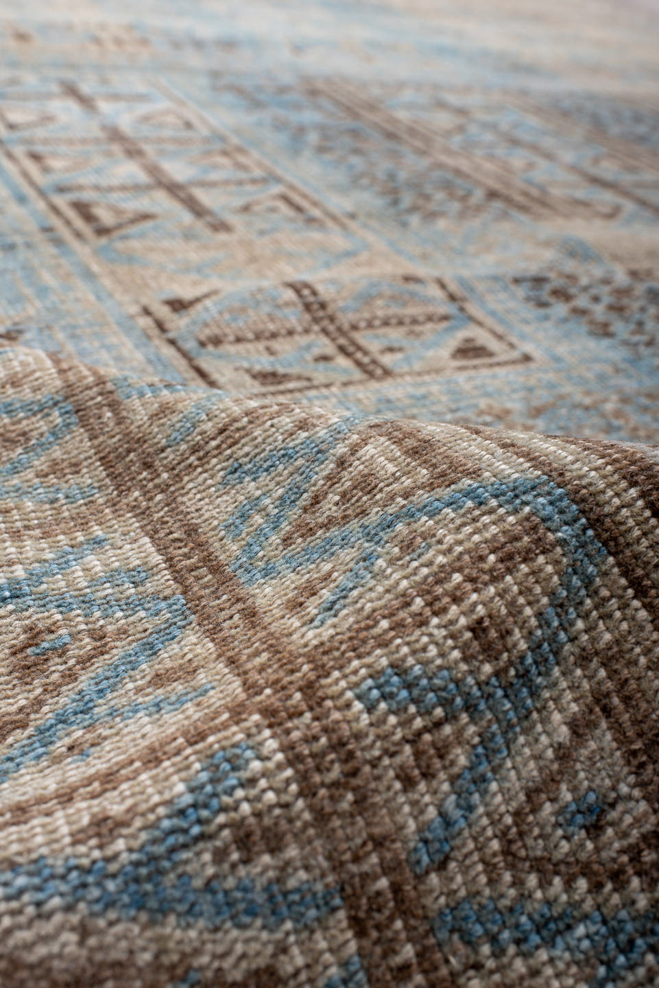 6' x 9' one-of-a-kind handmade antique Belouch medium size rug. Color palette: ivory, sky blue, brown, charcoal, taupe