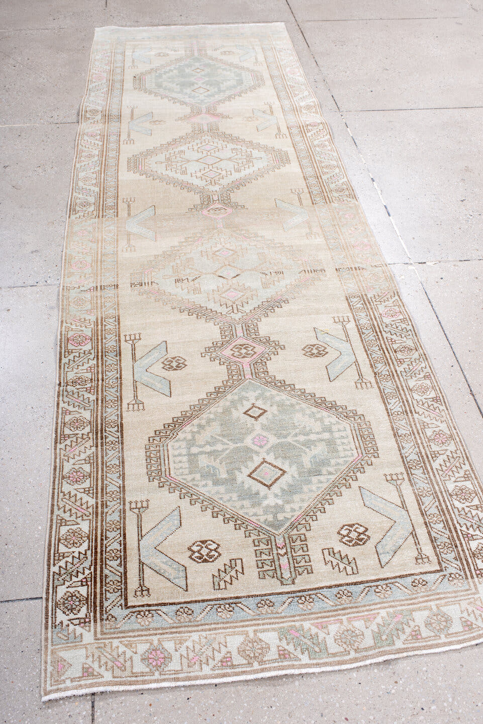 3' x 9' one-of-a-kind handmade antique Sarab runner rug. Color palette: ivory, camel, pale blue, blush, taupe, sand, beige