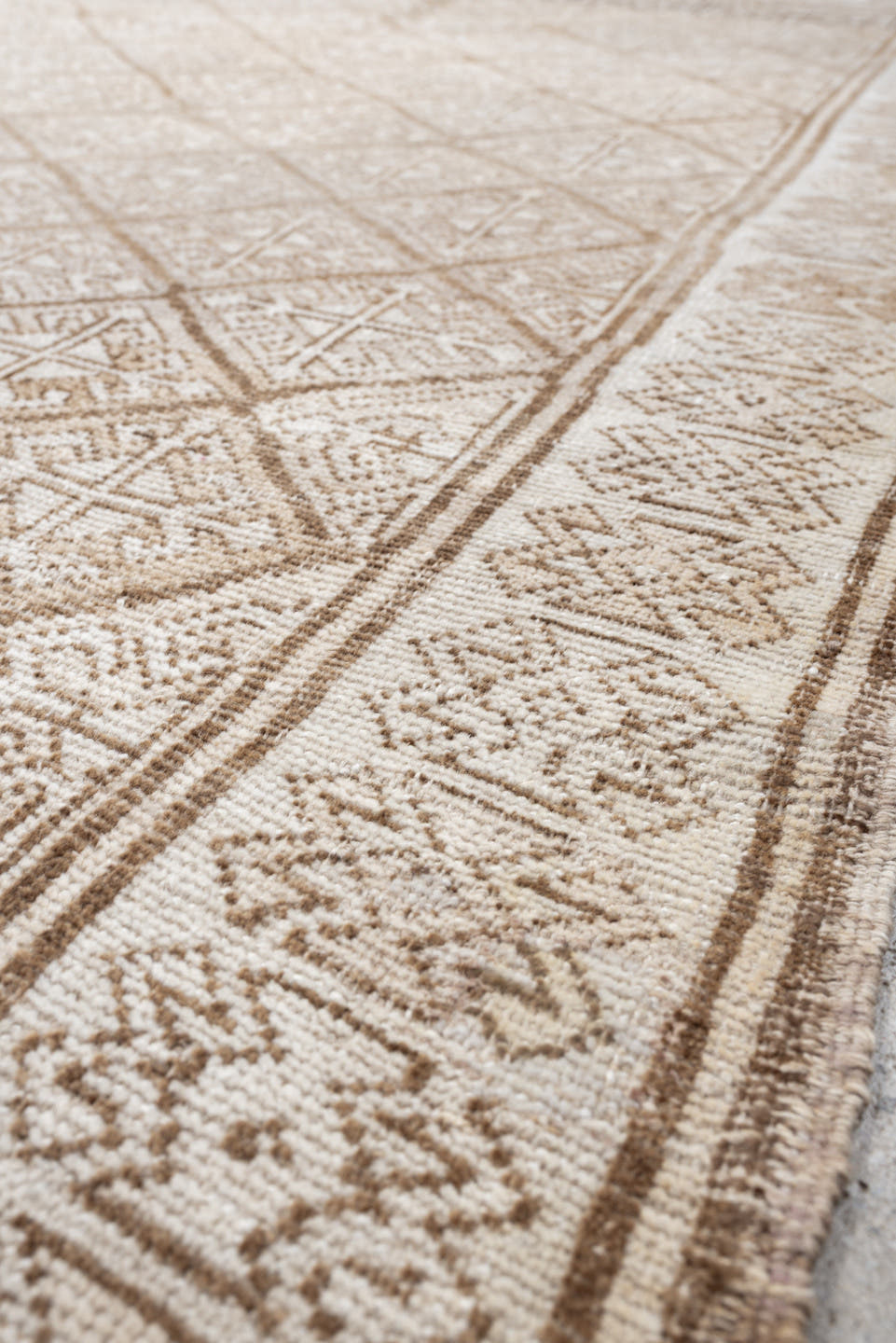 5' x 7' one-of-a-kind handmade antique medium size rug. Color palette: ivory, camel, taupe, beige, sand, gray
