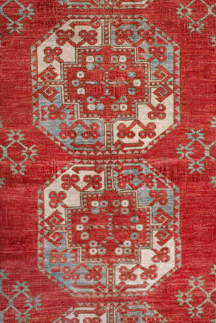 7' x 9' one-of-a-kind handmade antique Afghan rug. Color palette: red, ivory, rust, sky_blue, salmon, terracotta, brown