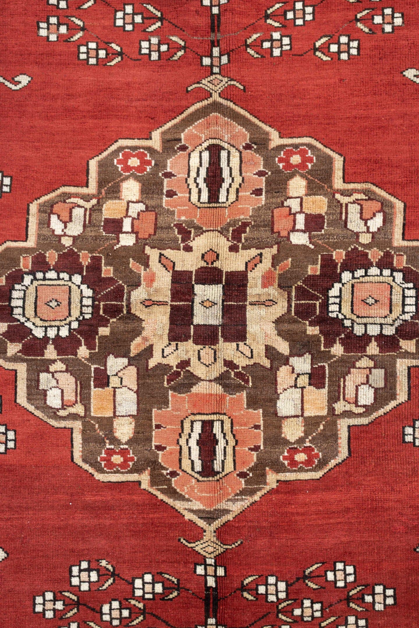 5' x 6' one-of-a-kind handmade antique Caucasian rug. Color palette: terracotta, ivory, taupe, brown, rose, mahogany, camel