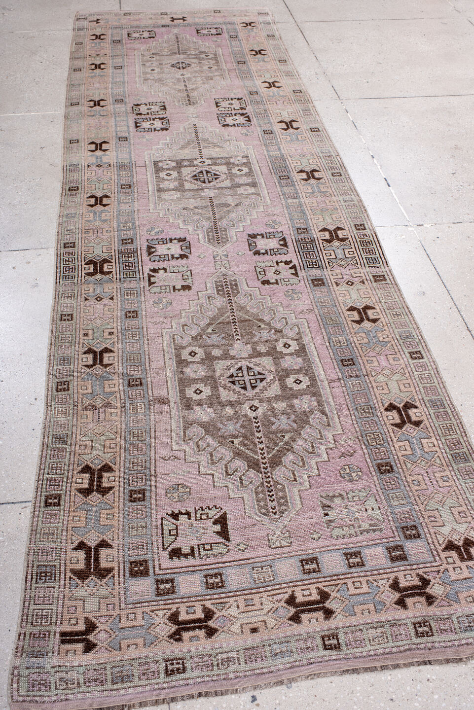3' x 11' one-of-a-kind handmade vintage Anatolian runner rug. Color palette: brown, gray, light gray, off-white, pink