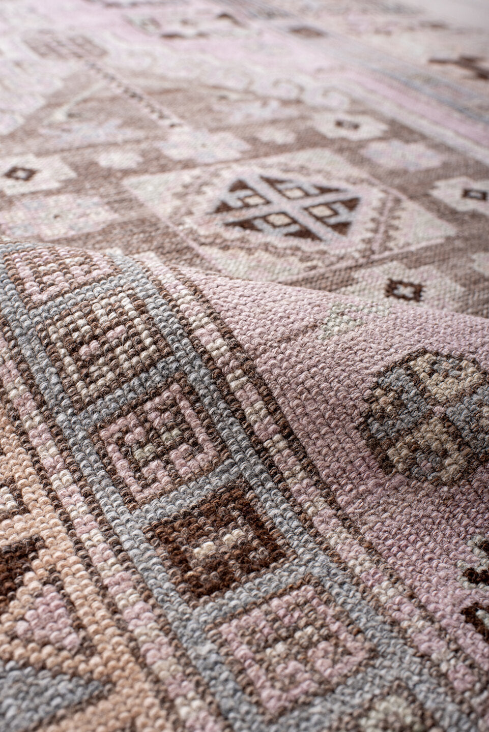 3' x 11' one-of-a-kind handmade vintage Anatolian runner rug. Color palette: brown, gray, light gray, off-white, pink