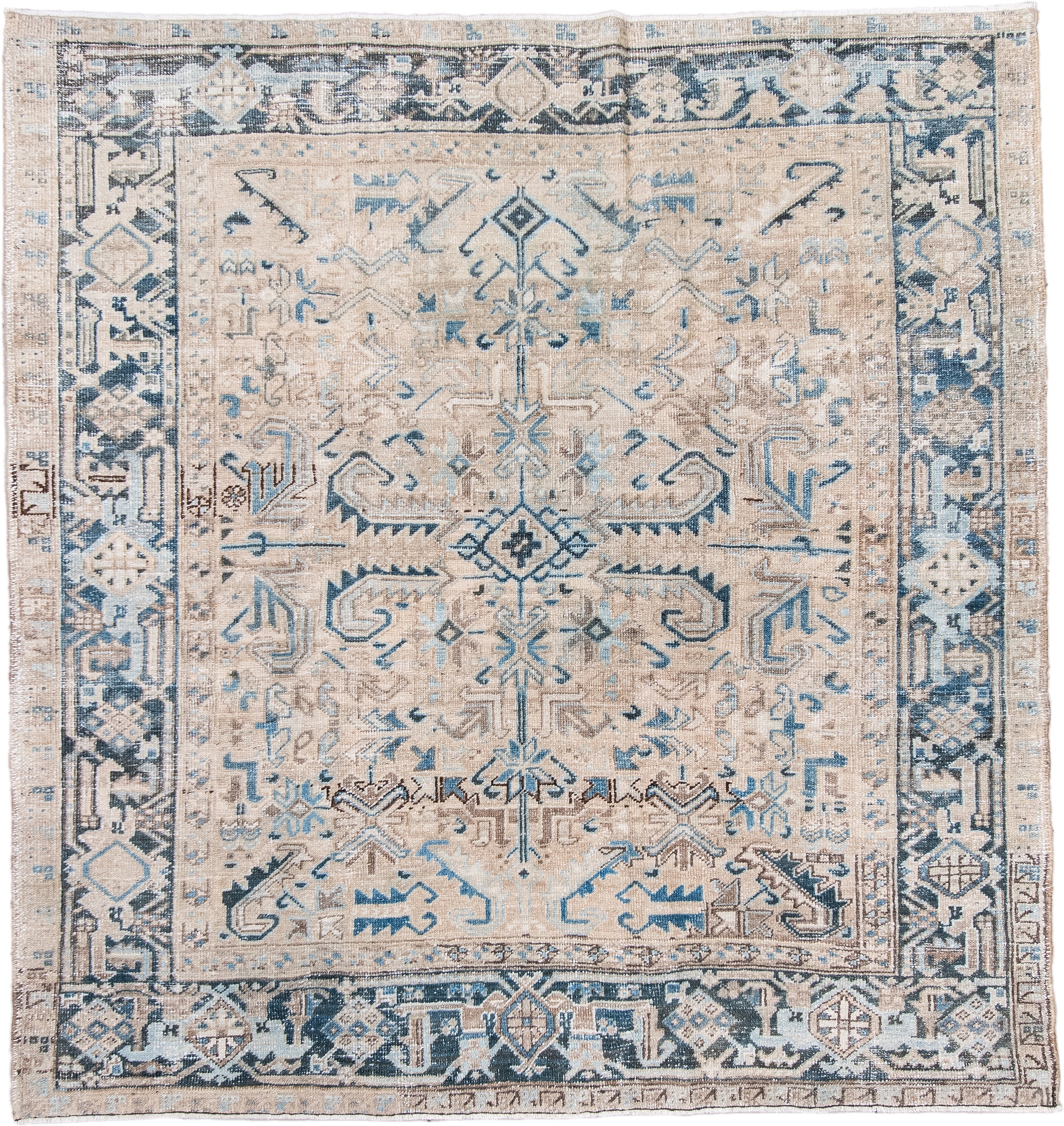 7' x 7' one-of-a-kind handmade antique Heriz rug. Color palette: ivory, beige, slate, taupe, sky blue, charcoal, gray