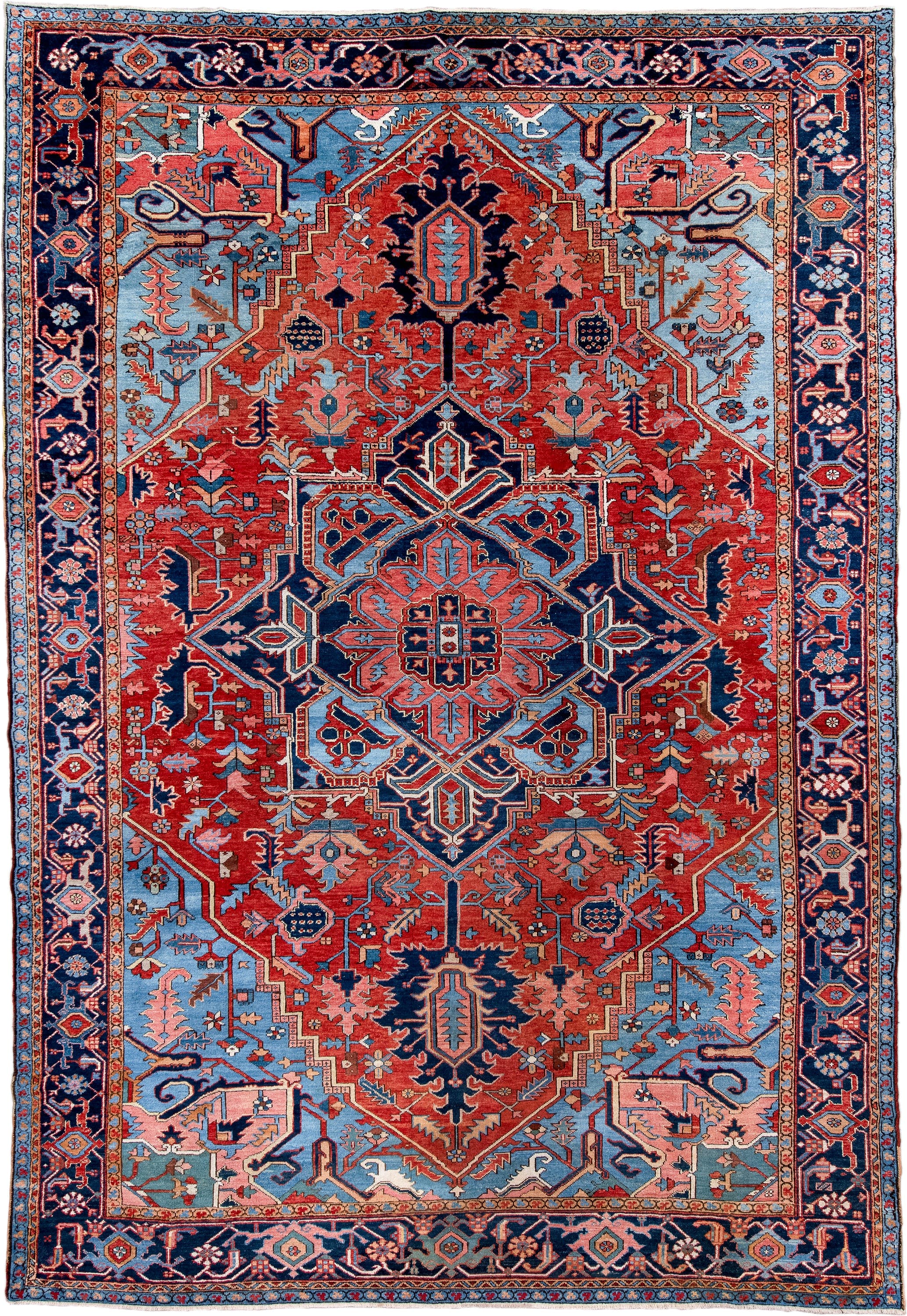 10' x 14' one-of-a-kind handmade antique Serapi large size rug. Color palette: rust, sky blue, navy, coral, ivory, slate