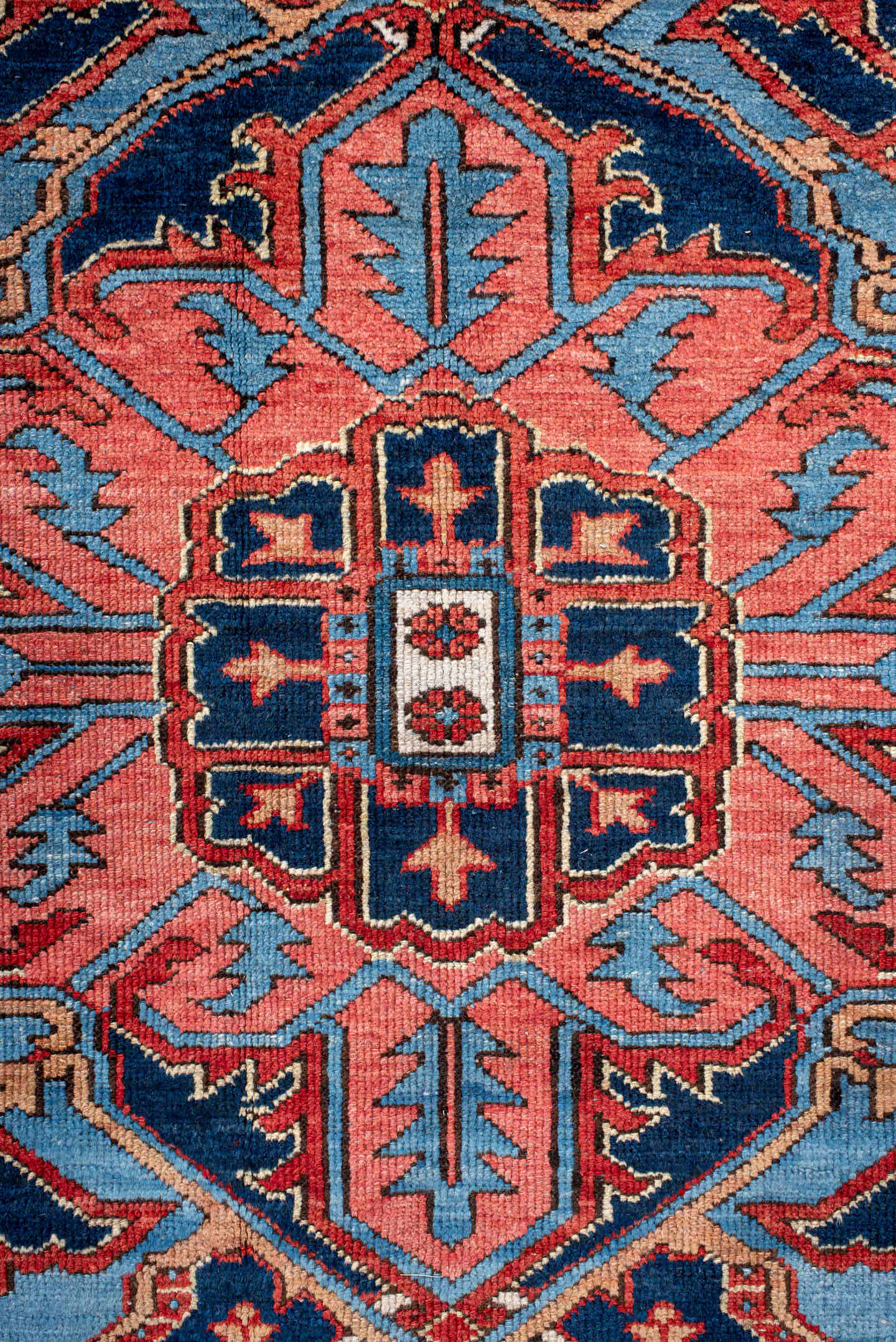 10' x 14' one-of-a-kind handmade antique Serapi large size rug. Color palette: rust, sky blue, navy, coral, ivory, slate