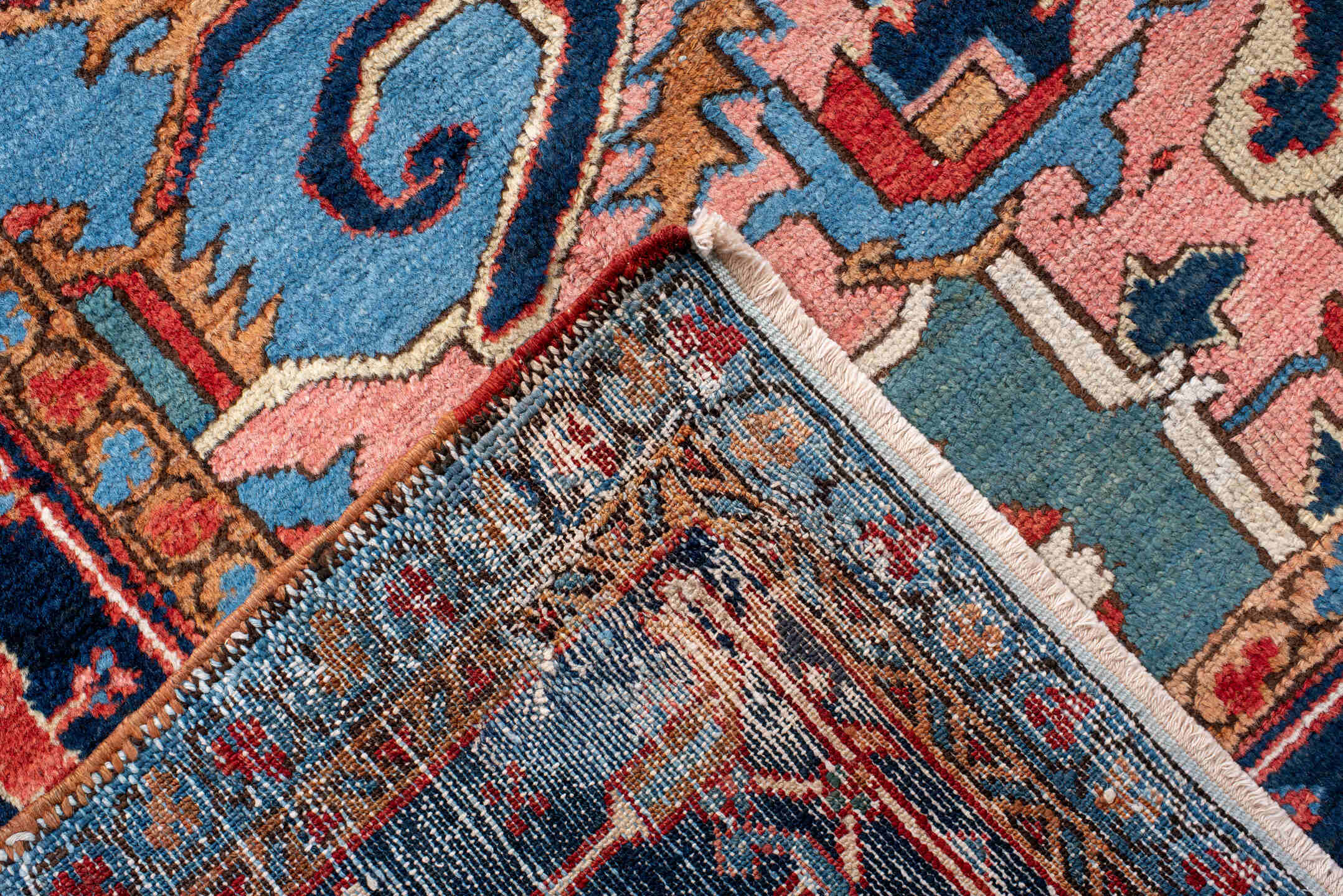 10' x 14' one-of-a-kind handmade antique Serapi large size rug. Color palette: rust, sky blue, navy, coral, ivory, slate