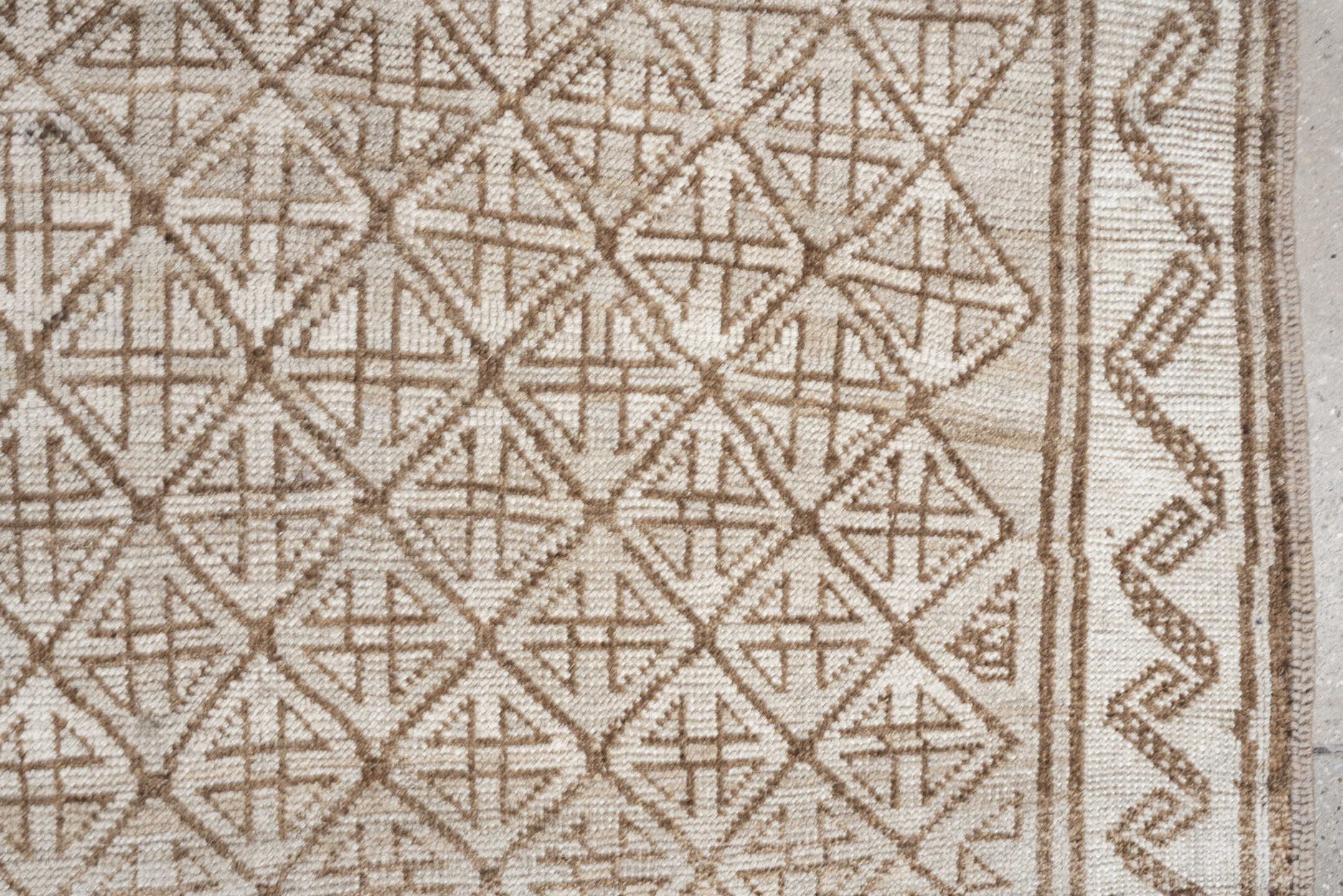 9' x 4' one-of-a-kind handmade antique Belouch rug. Color palette: ivory, camel, taupe, sand, light brown, beige, gray