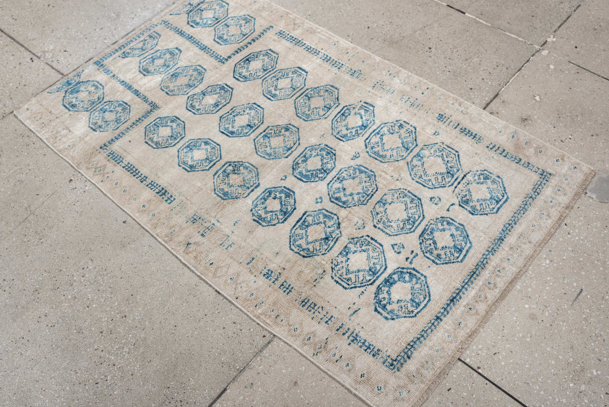 2' x 4' one-of-a-kind handmade antique Belouch small size rug. Color palette: ivory, sky blue, beige, taupe, light blue
