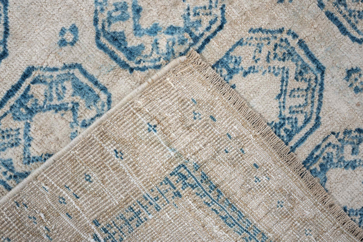 2' x 4' one-of-a-kind handmade antique Belouch small size rug. Color palette: ivory, sky blue, beige, taupe, light blue