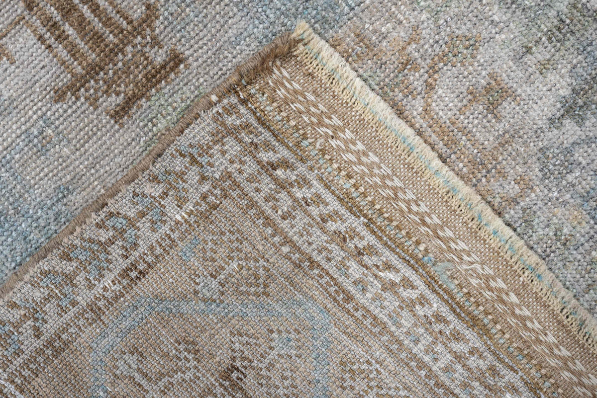 2' x 4' one-of-a-kind handmade antique Belouch small size rug. Color palette: ivory, camel, taupe, sky blue, beige