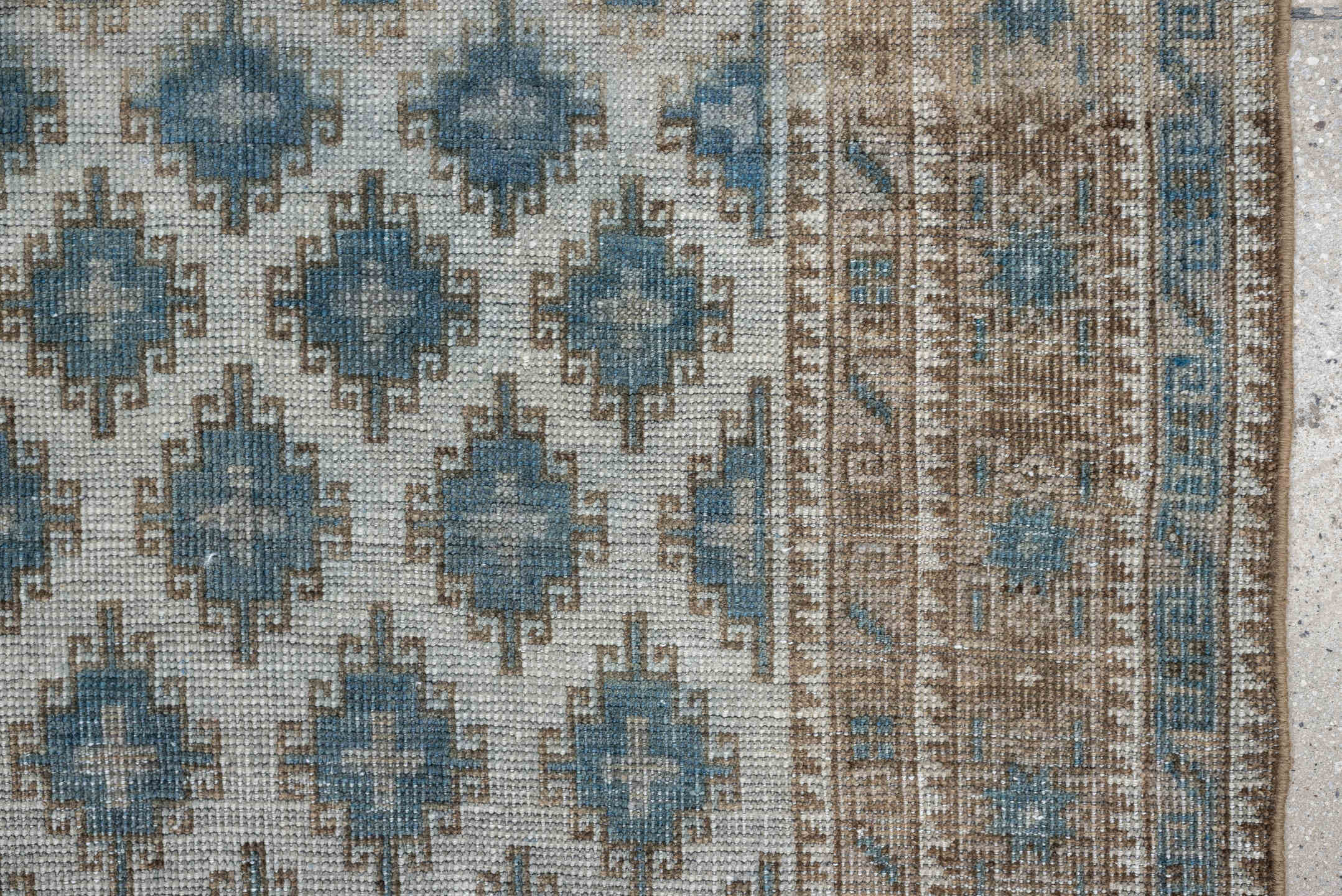 2' x 5' one-of-a-kind handmade antique Belouch small size rug. Color palette: ivory, sky blue, taupe, camel, beige