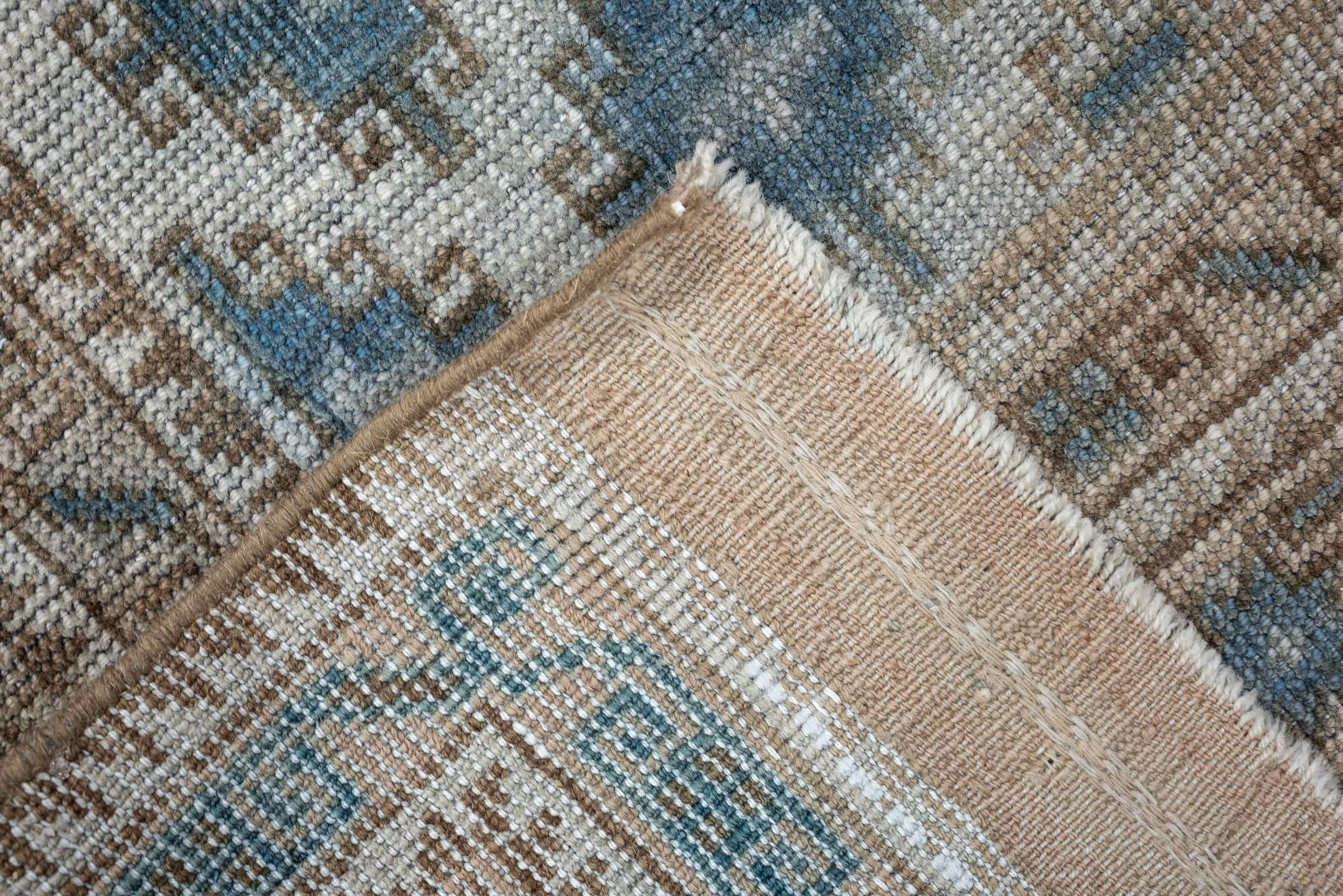 2' x 5' one-of-a-kind handmade antique Belouch small size rug. Color palette: ivory, sky blue, taupe, camel, beige