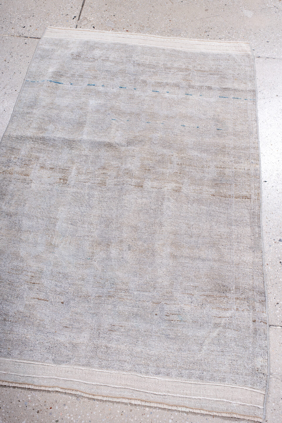 2' x 4' one-of-a-kind handmade antique Belouch small size rug. Color palette: ivory, cream, taupe, sky_blue, beige, gray