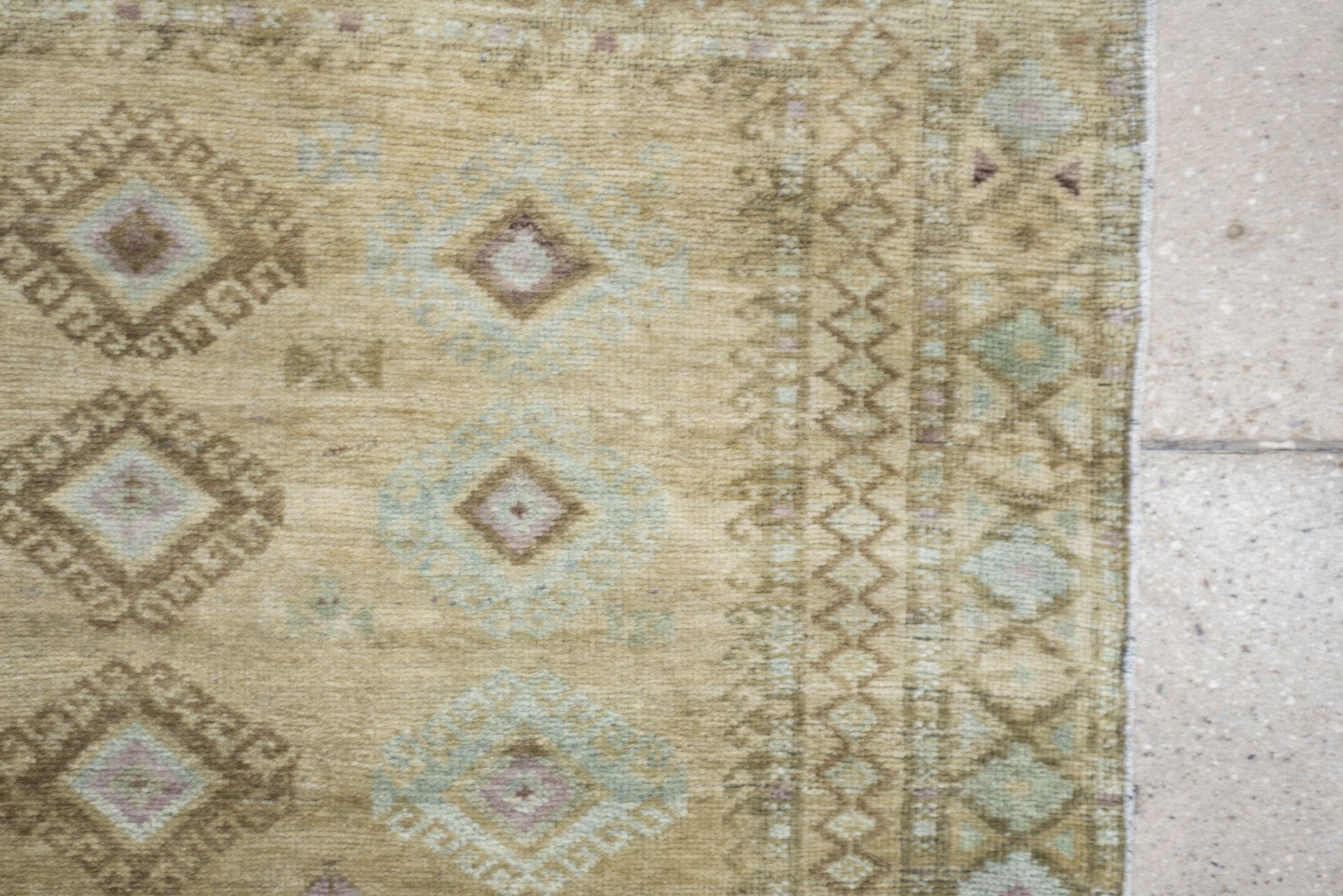 3' x 4' one-of-a-kind handmade antique Belouch small size rug. Color palette: camel, taupe, ivory, pale aqua, soft lavender