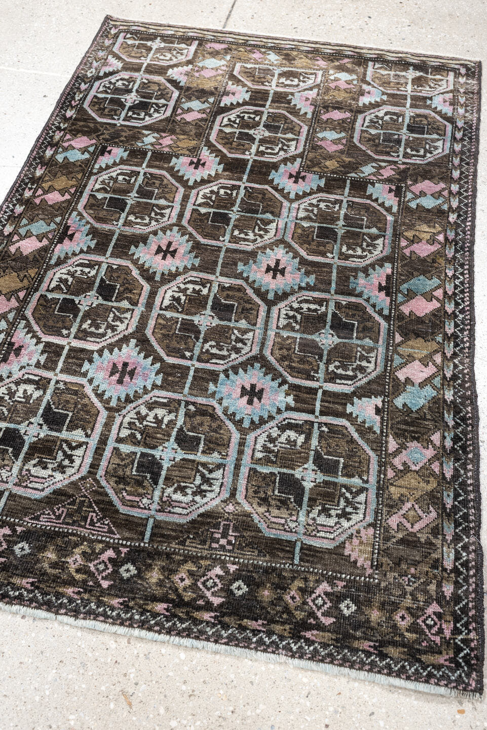 2' x 4' one-of-a-kind handmade antique Belouch small size rug. Color palette: brown, camel, blush pink, pale aqua, ivory