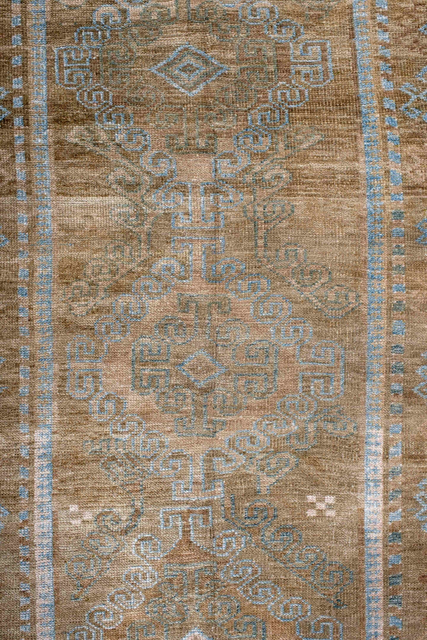 3' x 4' one-of-a-kind handmade antique Belouch small size rug. Color palette: taupe, camel, sky_blue, ivory, terra_cotta