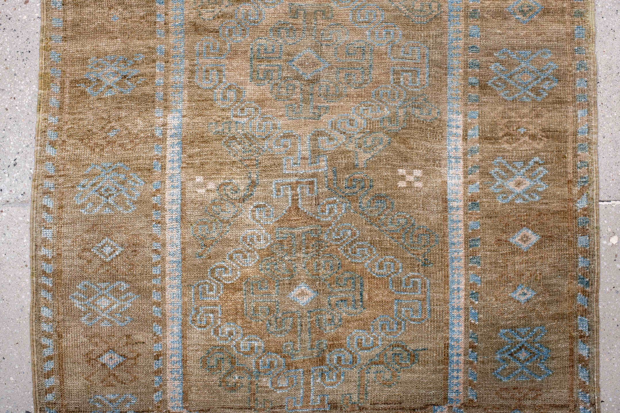 3' x 4' one-of-a-kind handmade antique Belouch small size rug. Color palette: taupe, camel, sky_blue, ivory, terra_cotta