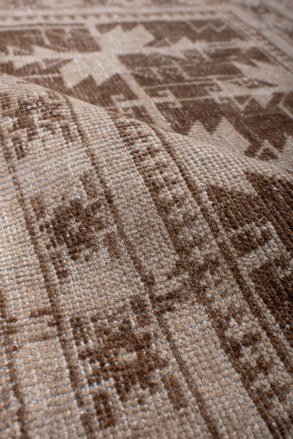 2' x 4' one-of-a-kind handmade antique Belouch small size rug. Color palette: ivory, taupe, camel, brown, beige, gray