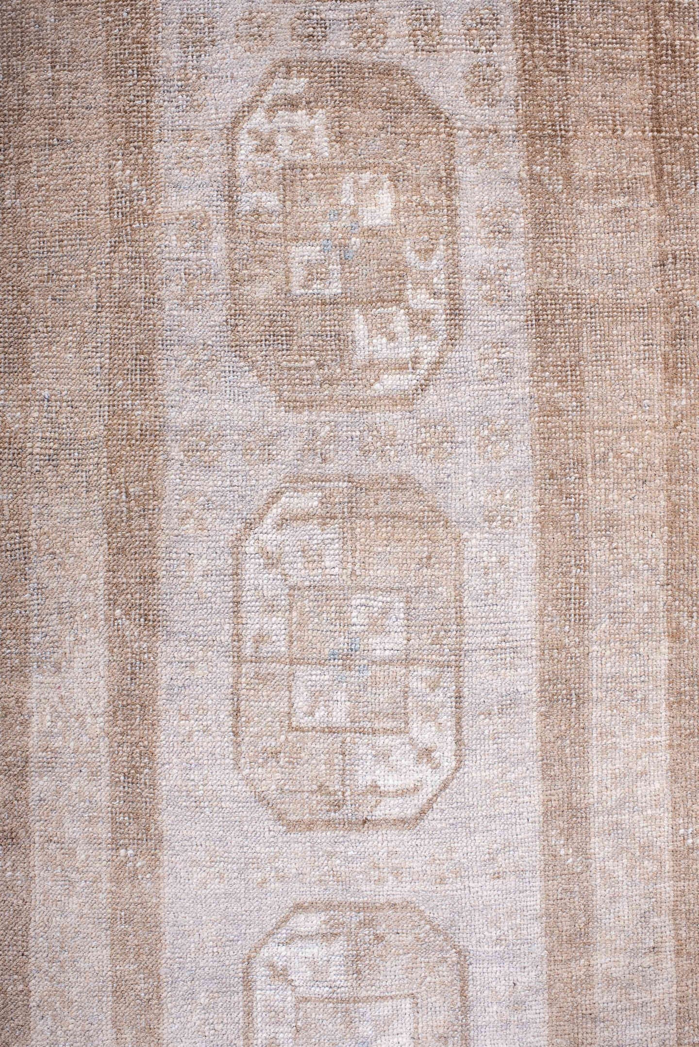 1' x 9' one-of-a-kind handmade antique Afghan rug. Color palette: ivory, taupe, beige, camel, sand, gray