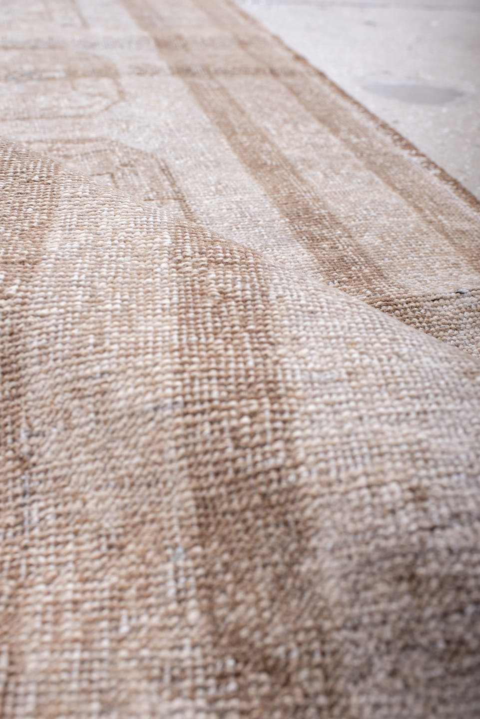 1' x 9' one-of-a-kind handmade antique Afghan rug. Color palette: ivory, taupe, beige, camel, sand, gray