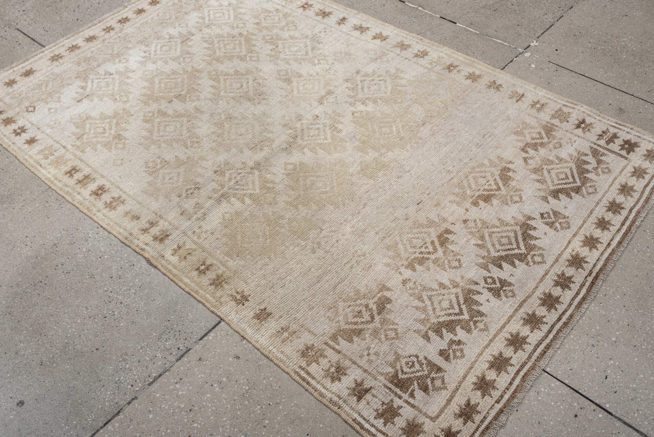 3' x 5' one-of-a-kind handmade antique Belouch small size rug. Color palette: ivory, camel, taupe, sand, beige, gray