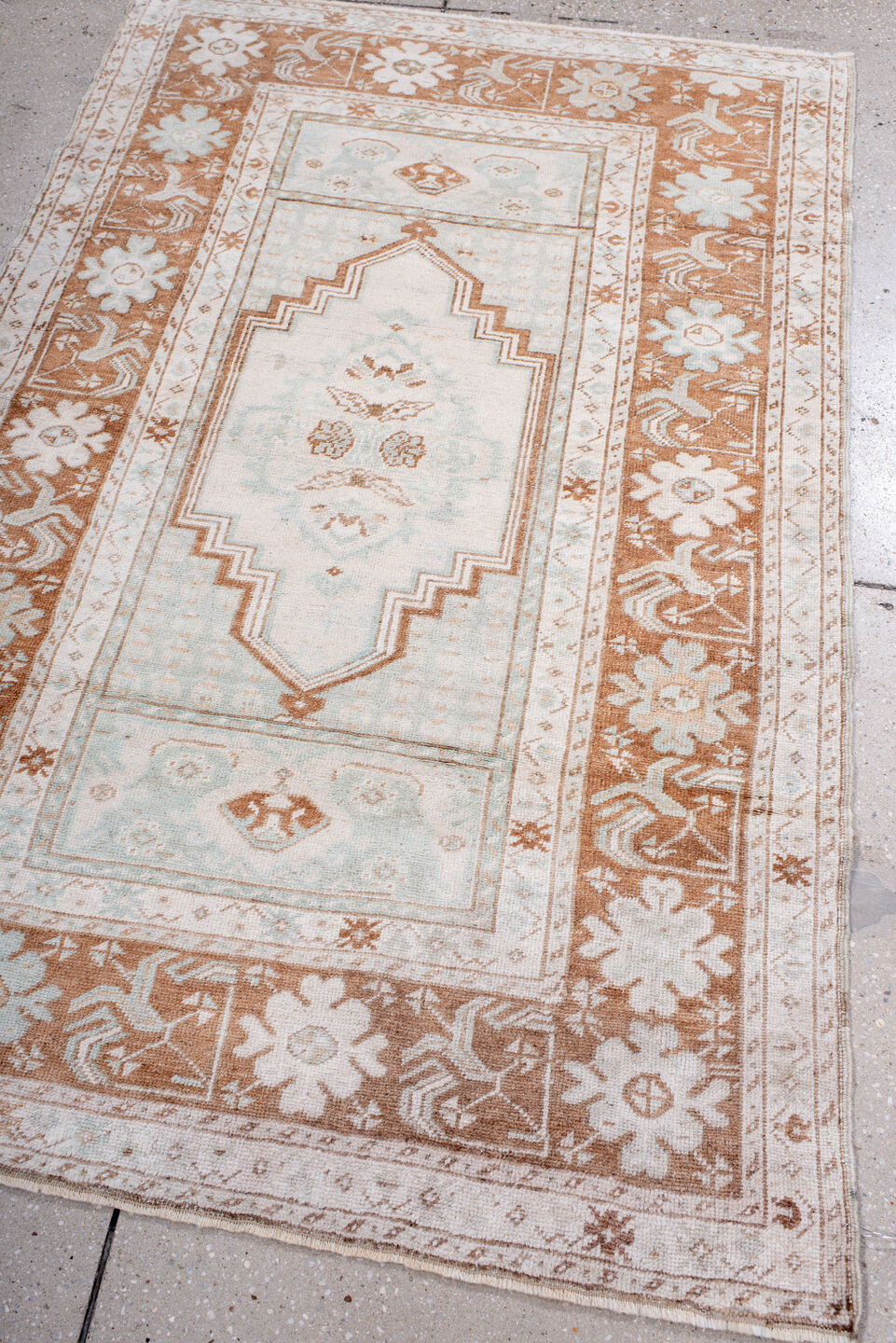 3' x 5' one-of-a-kind handmade antique Anatolian small size rug. Color palette: ivory, terra cotta, cream, pale blue, beige