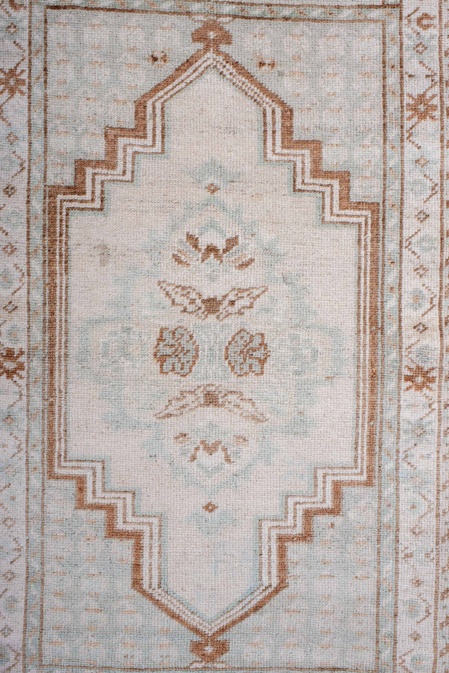 3' x 5' one-of-a-kind handmade antique Anatolian small size rug. Color palette: ivory, terra cotta, cream, pale blue, beige