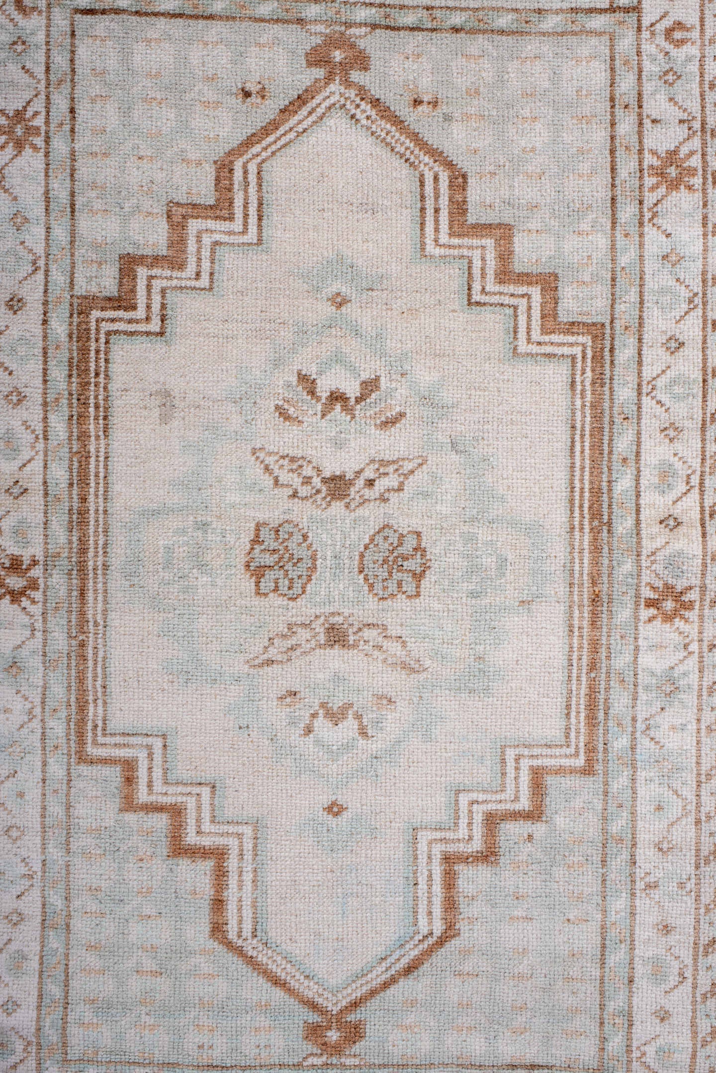 3' x 5' one-of-a-kind handmade antique Anatolian small size rug. Color palette: ivory, terra cotta, cream, pale blue, beige