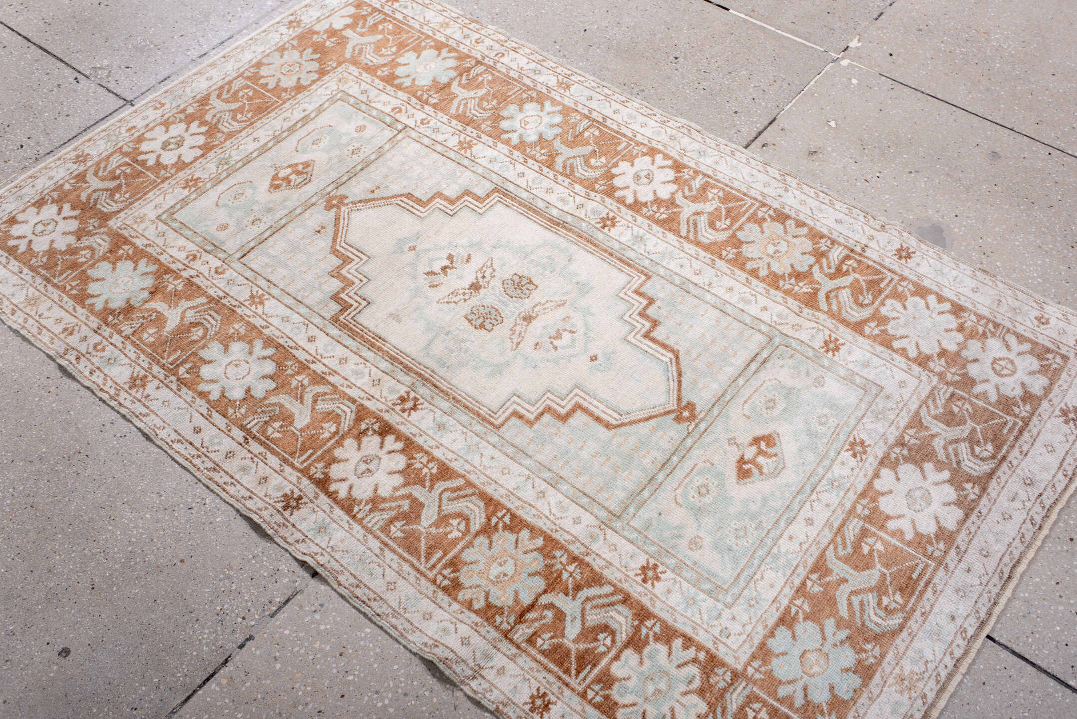 3' x 5' one-of-a-kind handmade antique Anatolian small size rug. Color palette: ivory, terra cotta, cream, pale blue, beige