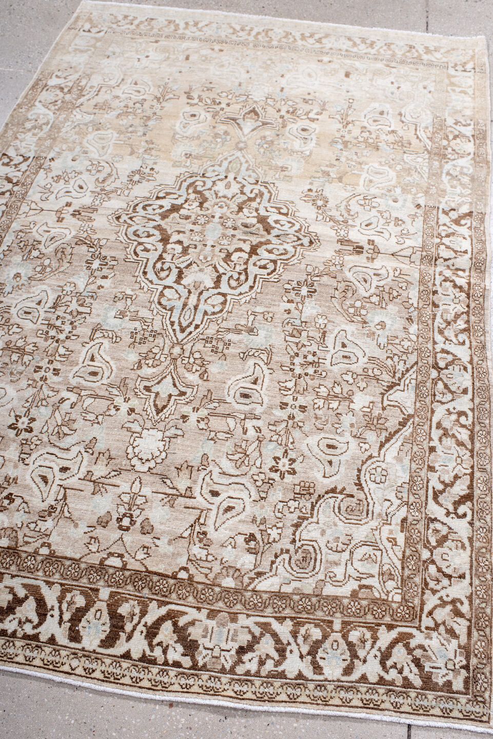 4' x 6' one-of-a-kind handmade antique Sarouk small size rug. Color palette: ivory, taupe, camel, brown, cream, beige, gray