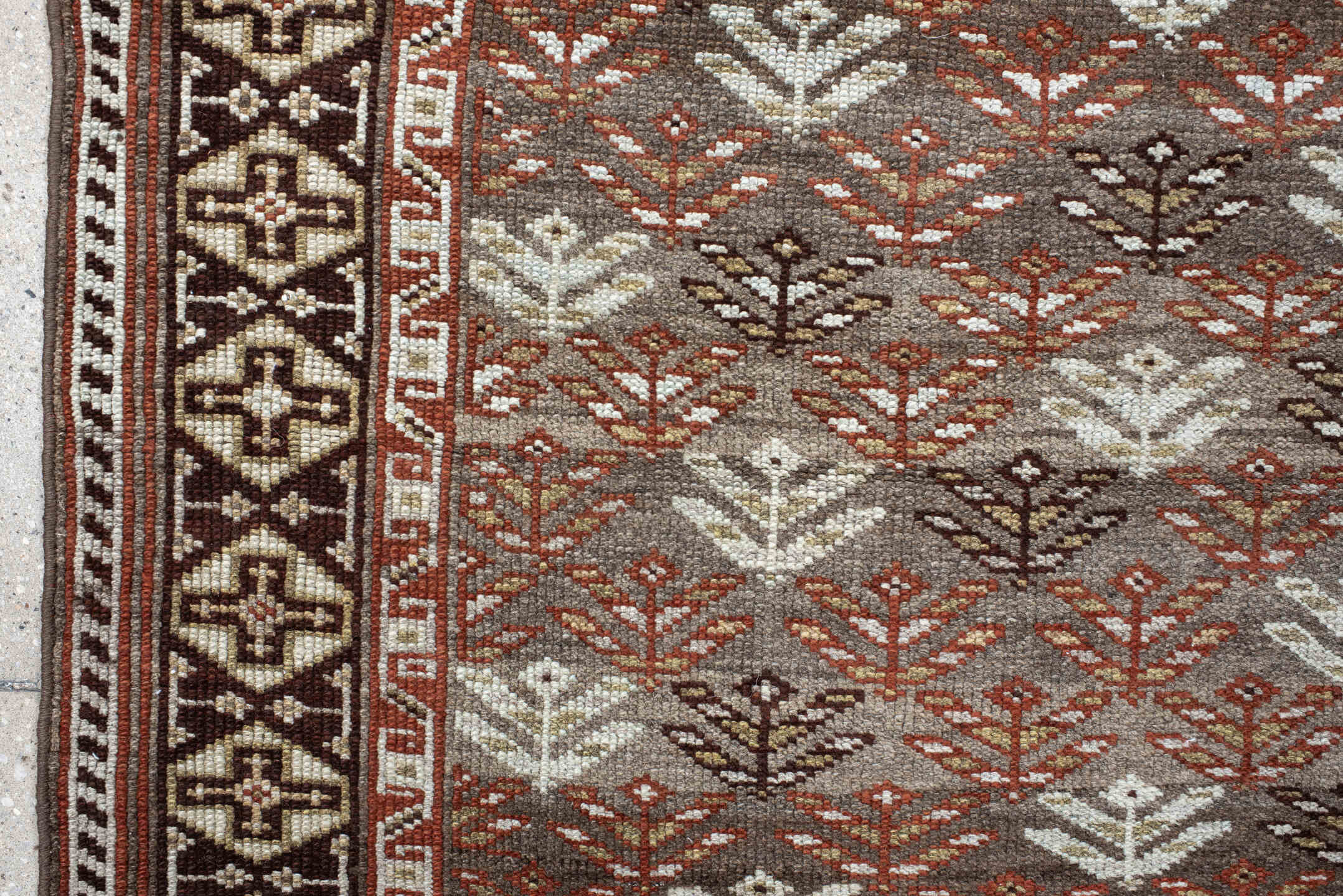 4' x 9' one-of-a-kind handmade antique Kurd runner rug. Color palette: taupe, brown, ivory, rust, charcoal, beige, gray