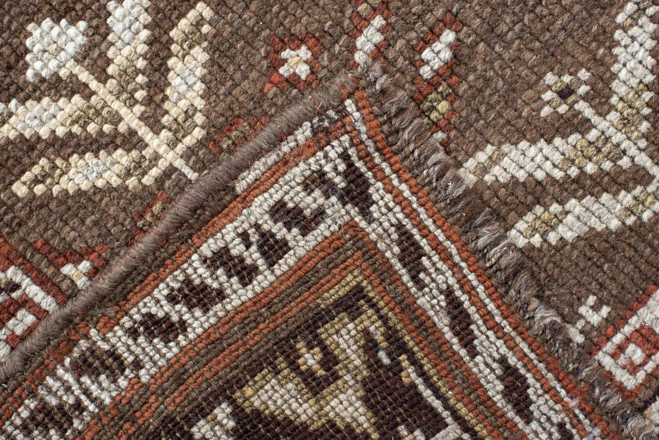 4' x 9' one-of-a-kind handmade antique Kurd runner rug. Color palette: taupe, brown, ivory, rust, charcoal, beige, gray