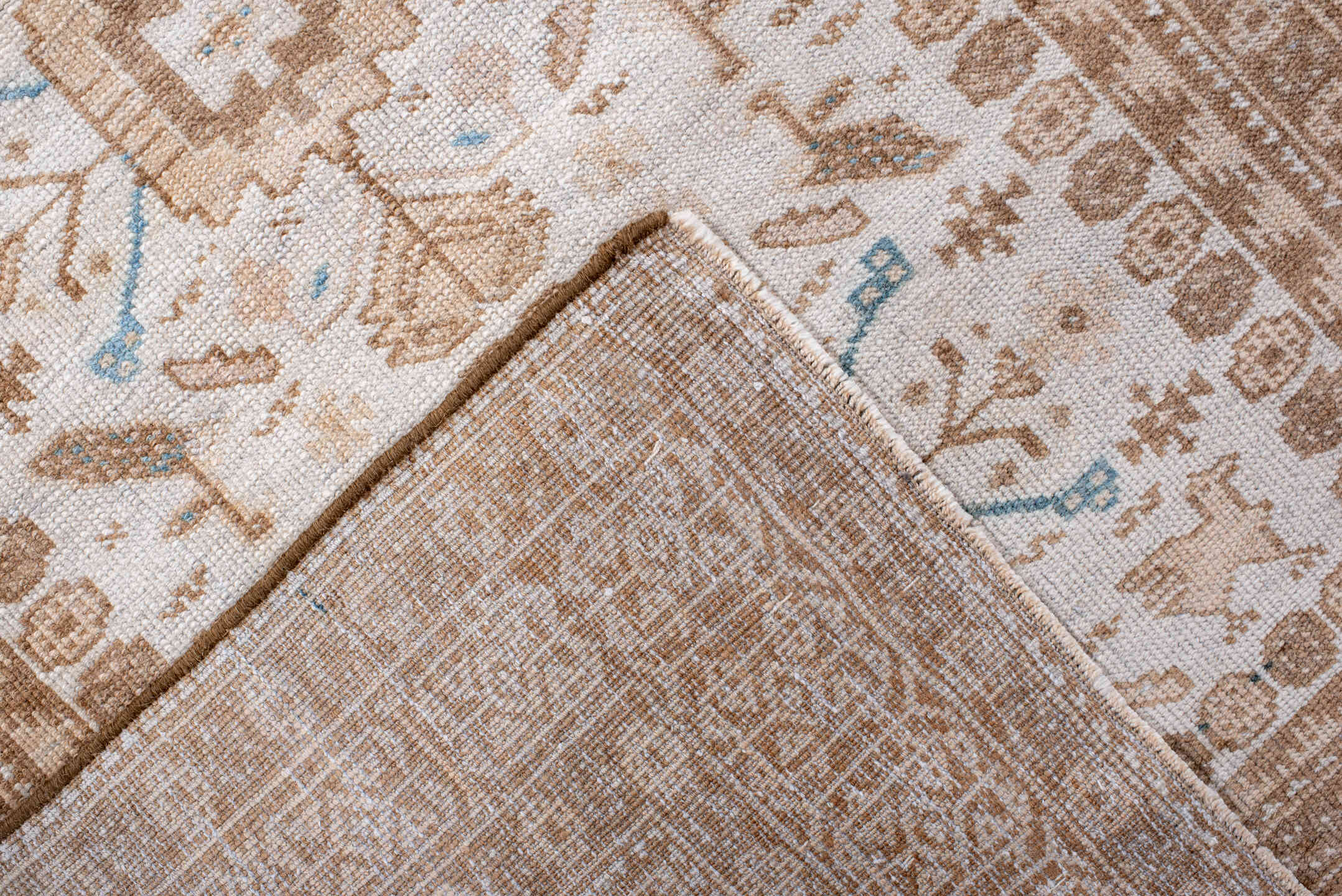 2' x 10' one-of-a-kind handmade antique Belouch runner rug. Color palette: ivory, camel, taupe, sand, pale blue, beige, gray