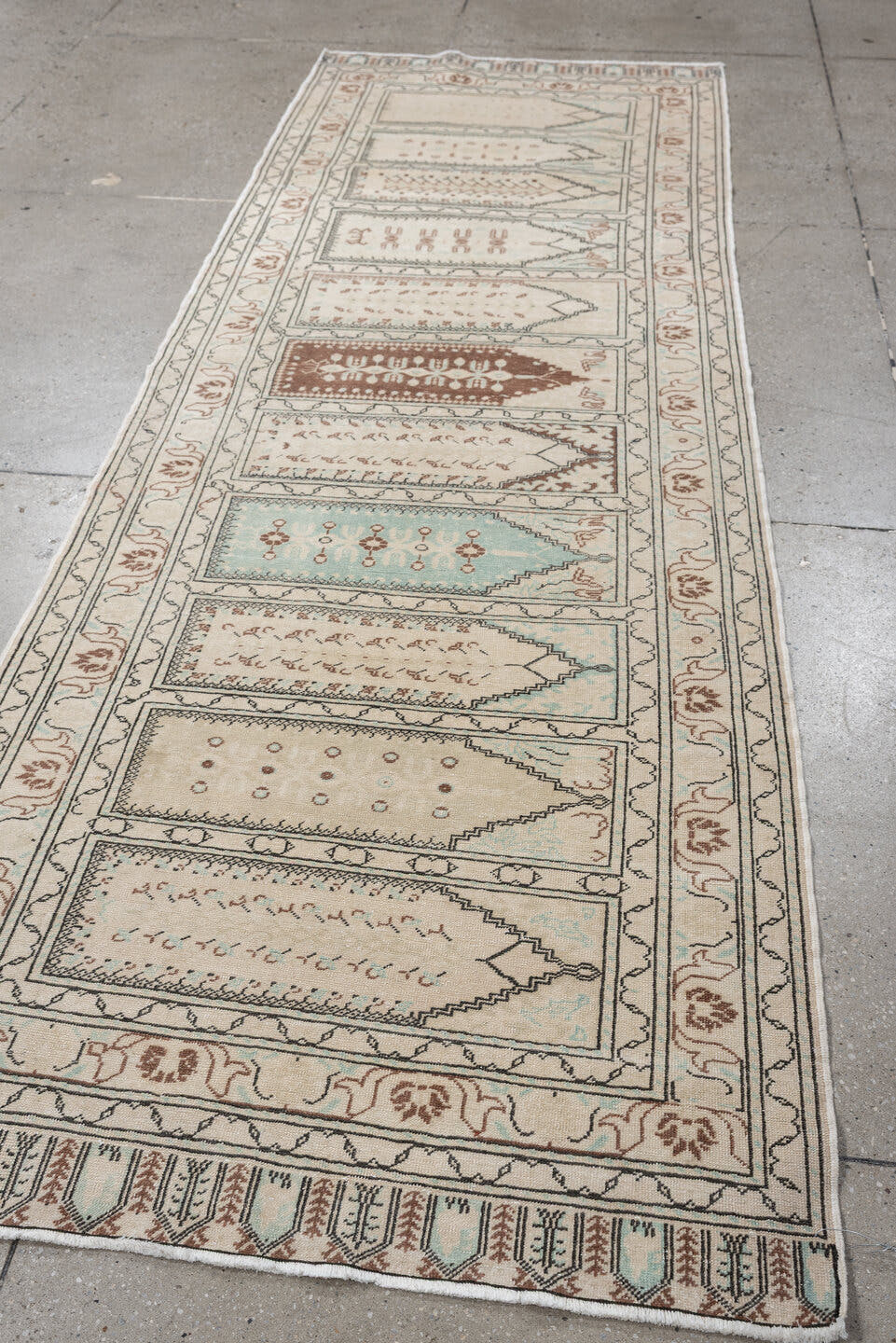 3' x 9' one-of-a-kind handmade antique Kaisary runner rug. Color palette: ivory, taupe, pale aqua, terracotta, camel