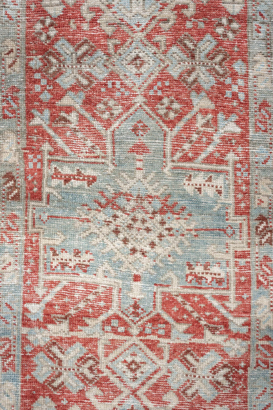 3' x 10' one-of-a-kind handmade vintage Heriz runner rug. Color palette: pale blue, terracotta, ivory, brick red, taupe