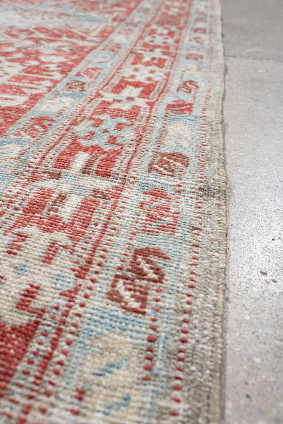 3' x 10' one-of-a-kind handmade vintage Heriz runner rug. Color palette: pale blue, terracotta, ivory, brick red, taupe