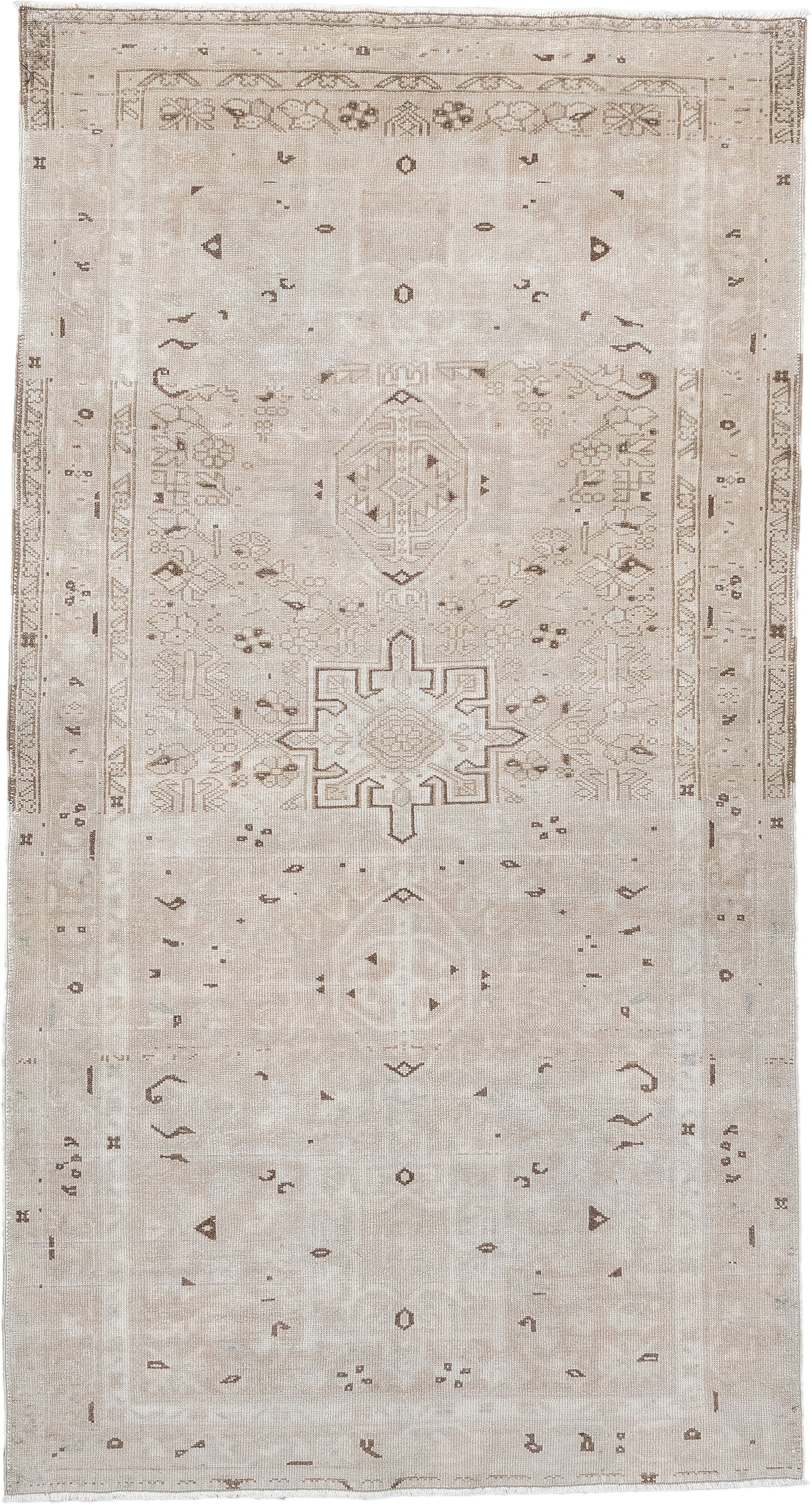 6' x 3' one-of-a-kind handmade vintage Karaje rug. Color palette: ivory, taupe, beige, camel, brown, gray